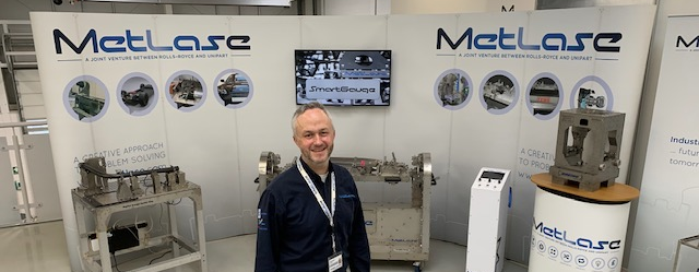 Man standing in front of Metlase products