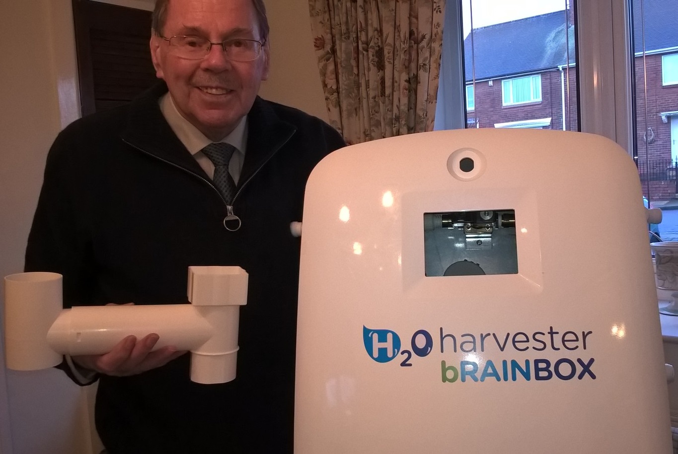 Melvyn Davenport next to H2O HARVESTER bRAIN BOX