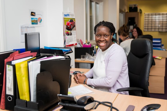 A person happy with her job.