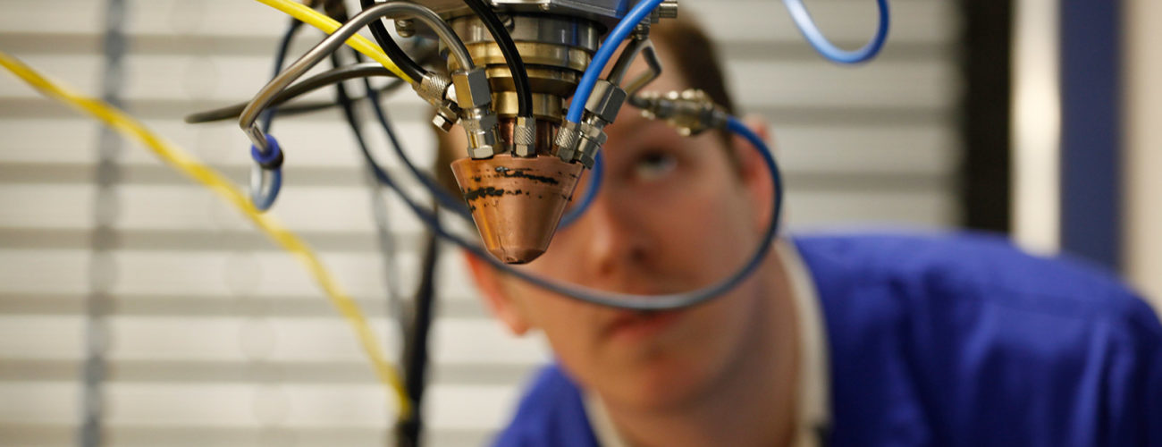 Man inspecting wiring